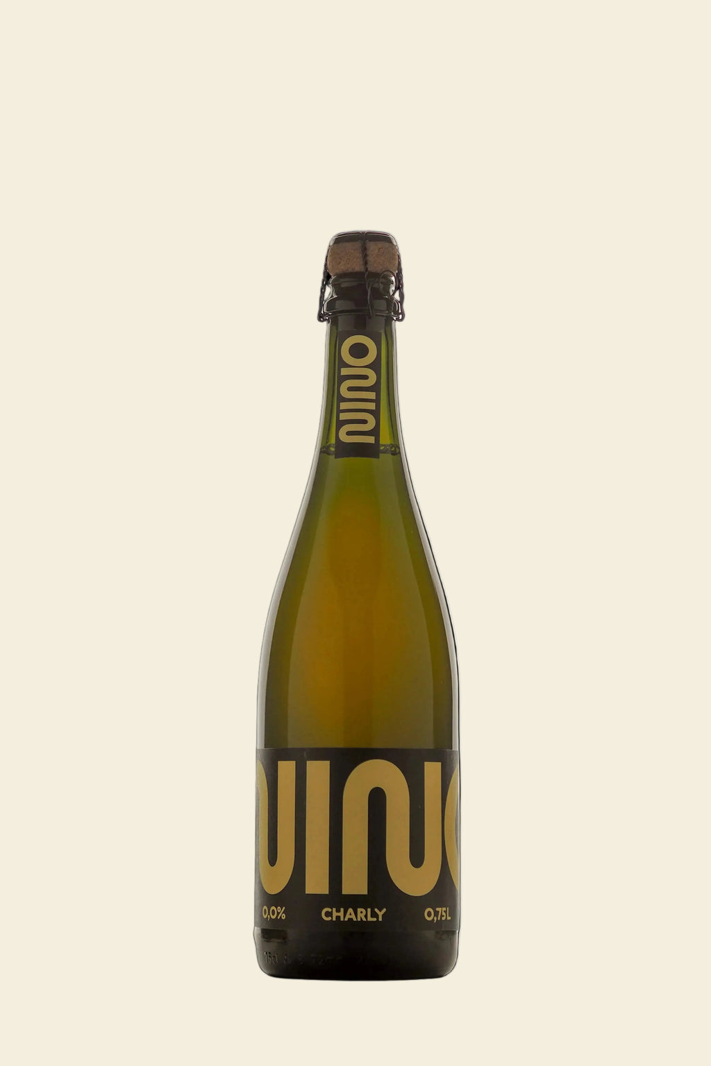 A bottle of Nino Charly sparkling wine on a solid black background. The bottle is a dark olive-green glass with a gold foil seal and a black label featuring the brand name 'Vini' in large gold letters.