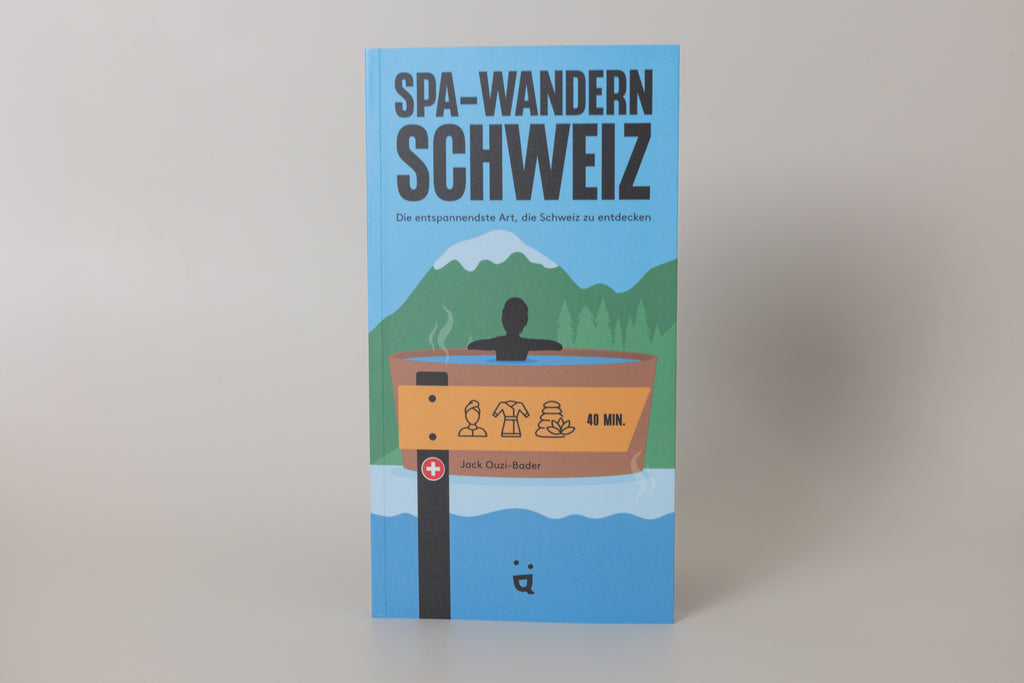 Book cover of 'Spa-Wandern Schweiz' with illustration of a person in a hot tub and mountains.